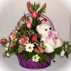 Send an arrangement of quality roses and lilies with a small teddy to Fernwood Cape Town