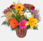 Deliver a mixture of bright coloured flowers in a vase - click to enlarge