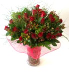 Send choice grade red roses in a glass vase - Click to enlarge